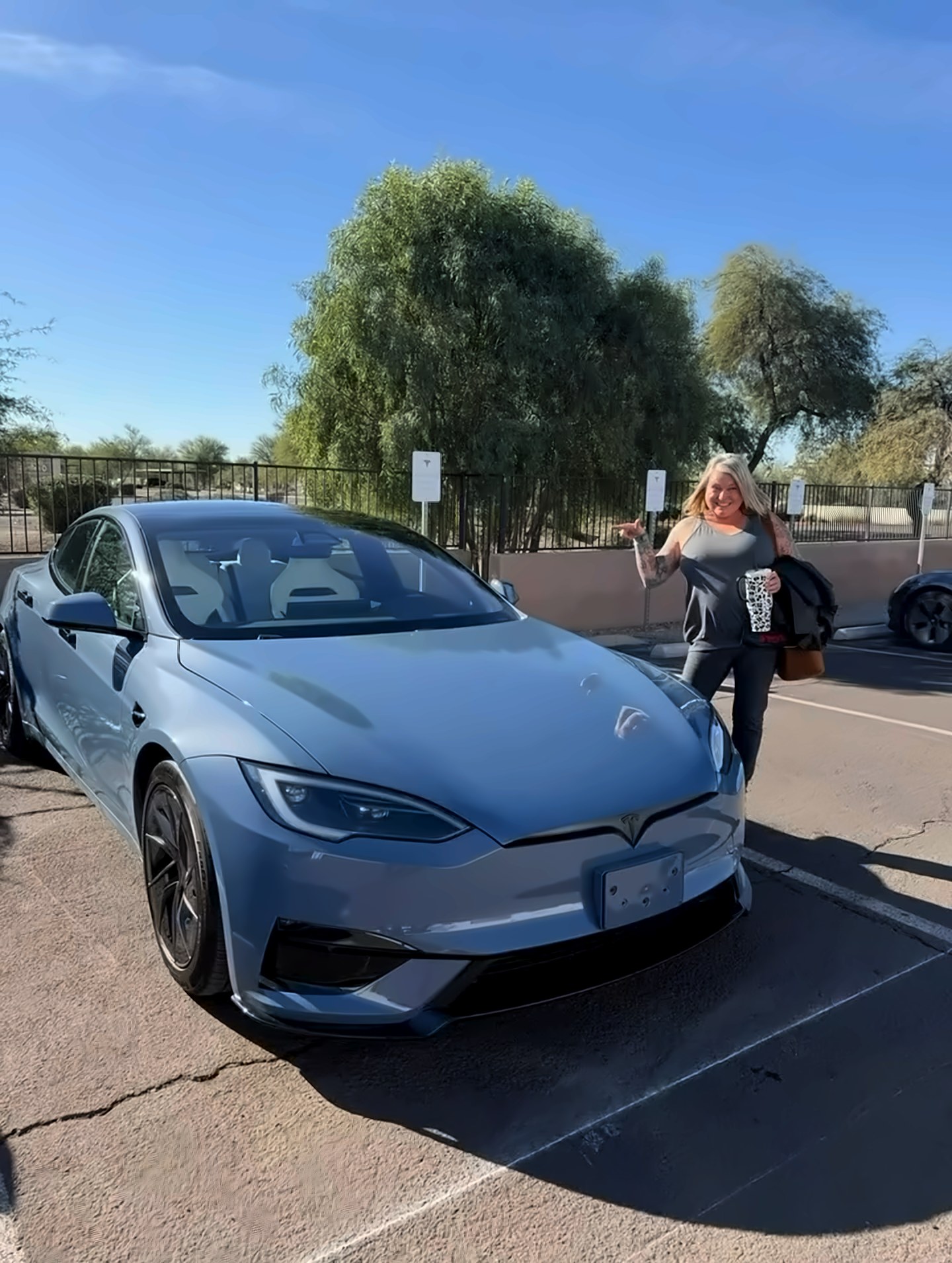 Teigh Wade with her Frost Blue Tesla Model S Plaid